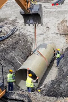 Laying and joining of large diameter fiber reinforced plastic pipes Stock Photos