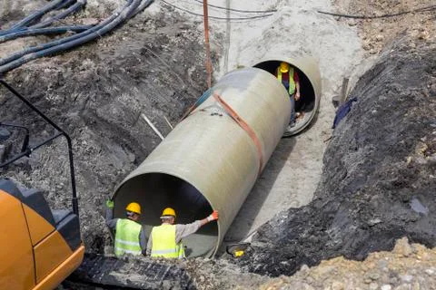 Laying and joining of large diameter pipes Stock Photos