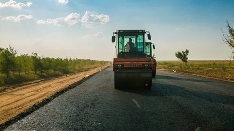 Laying asphalt timelapse. Road Construction Stock-Footage 87662386
