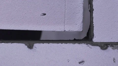 Laying brick on concrete close-up Stock Footage 121177337