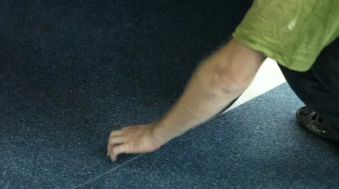 Laying on the carpet adhesive Stock-Footage 12546376