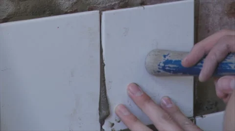 Laying ceramic tile on a wall. Close-up. 스톡 동영상 43129782