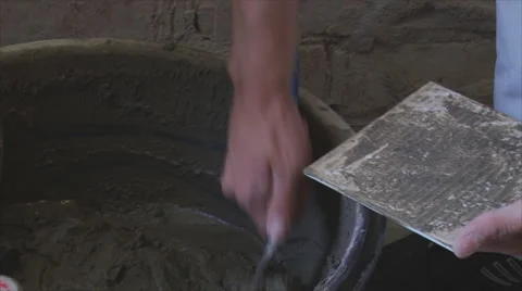 Laying ceramic tile on a wall 動画素材 43129798