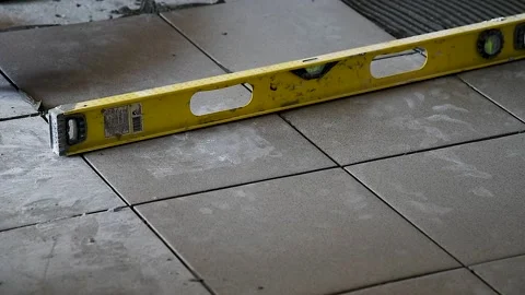 Laying of ceramic tiles Video stock 220032132