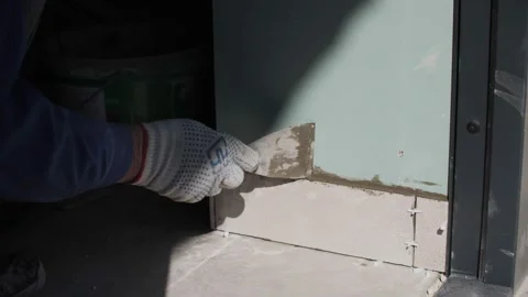 Laying ceramic tiles, hands close-up, spatula in hand Stock Footage 162486205