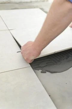 Laying Ceramic Tiles Stock Photos