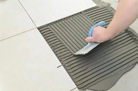 Laying Ceramic Tiles Stock Photos