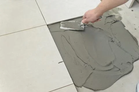 Laying Ceramic Tiles Stock Photos