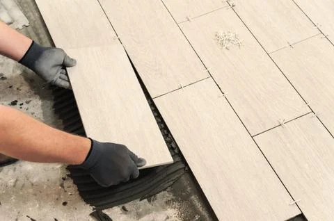 Laying Ceramic Tiles Stock Photos