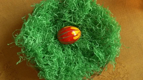 Laying Easter eggs in the basket Stock Footage 83552922