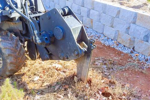 Laying fiber optic cables with the help of a trencher cable plough tractor Stock Photos