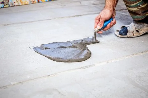 Laying floor ceramic tile Stock Photos