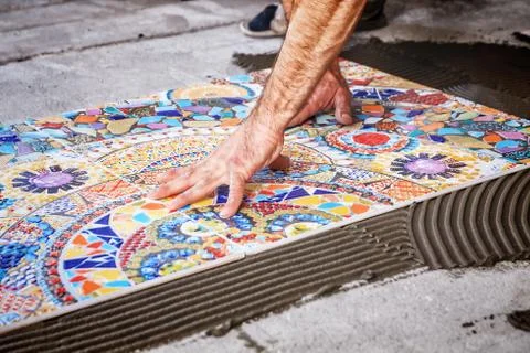 Laying floor ceramic tile Stock Photos