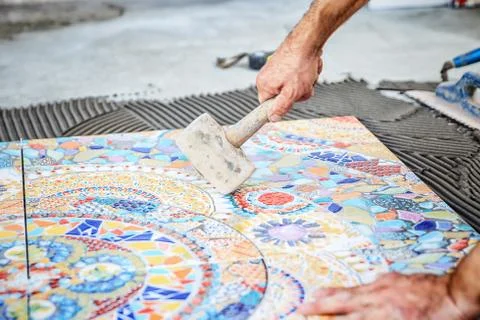 Laying floor ceramic tile Stock Photos