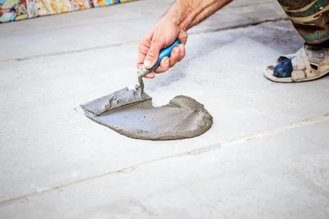 Laying floor ceramic tile Stock Photos