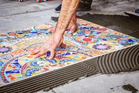 Laying floor ceramic tile Stock Photos