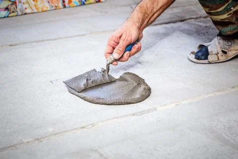 Laying floor ceramic tile Stock Photos