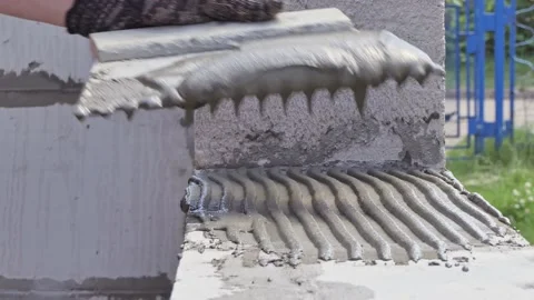 Laying gas blocks. close-up laying glue on gas silicate. Stock Footage 201624977