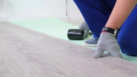 Laying laminate on the floor Stock Footage 76523150