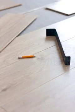 Laying laminate flooring Stock Photos