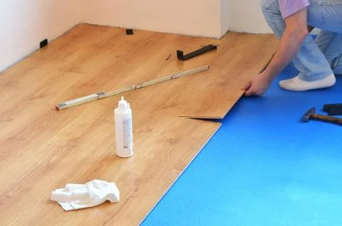 Laying laminate flooring Stock Photos