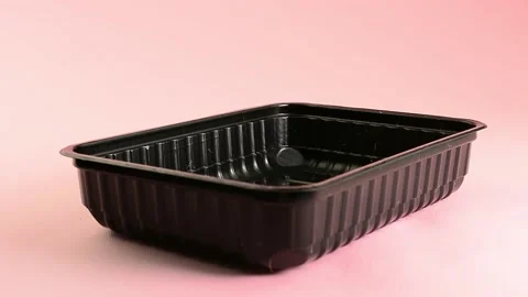 Laying the linen mat in a plastic container for sowing micro-greens Stock Footage 132962319