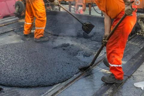 Laying of mastic surface Stock Photos