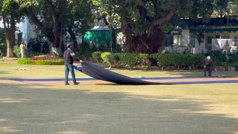 Laying of matting for prayer Video stock 324515005