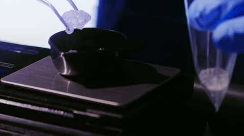 Laying meth bags on a table Stock Footage 30476655