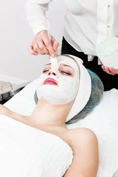 Laying of mudpack Stock Photos