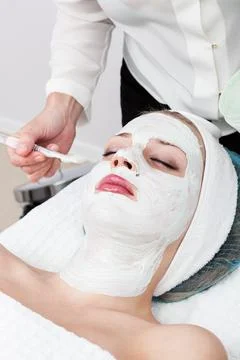 Laying of a mudpack Stock Photos