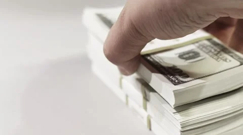 Laying out a Pack of Dollars Stock-Footage 43916442