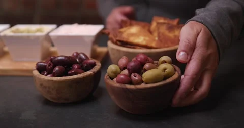 Laying Out Tapas Spread in Slow Motion Stock Footage 274774338
