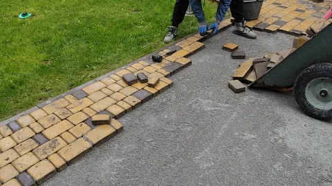 Laying paving slabs Stock Footage 325671353