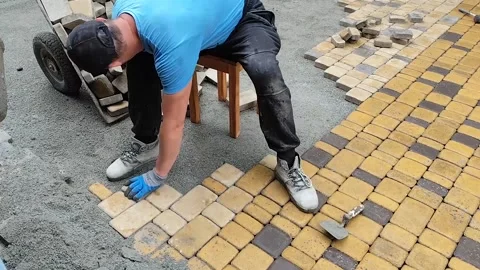 Laying paving slabs Stock Footage 325671508