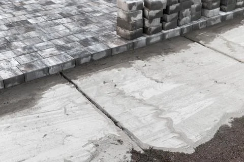 Laying of paving slabs, ground alignment Stock Photos