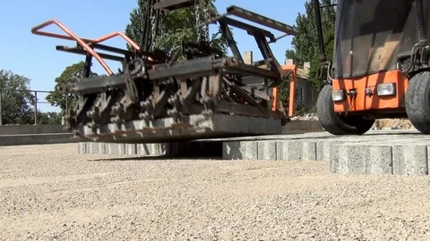 Laying paving slabs machine Stock Footage 112658152