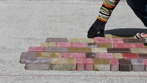Laying Paving Slabs by mosaic close up. Road Paving, construction Stock Footage
