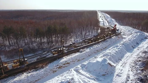 Laying a pipe in a trench Stock Footage 170919694