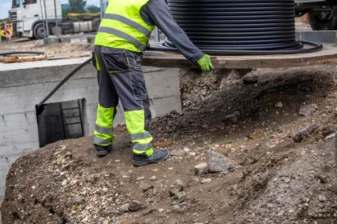 Laying the power cable under the ground Stock Photos