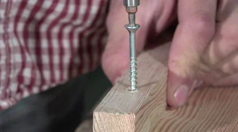 Laying a screw electric screwdriver Stock Footage 56427205