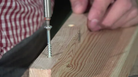 Laying a screw electric screwdriver Stock Footage 56427991