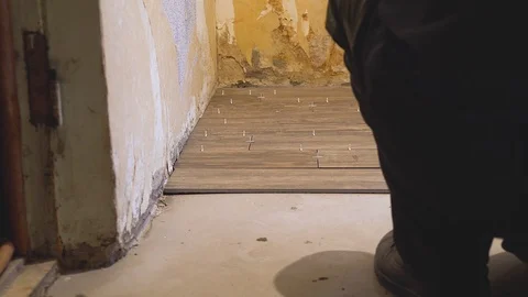 Laying tile on the floor Stock Footage 109063284