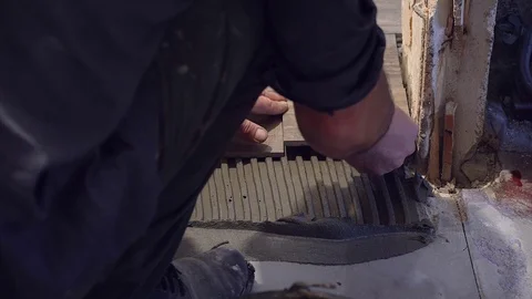 Laying tile on the floor Stock Footage 112221400