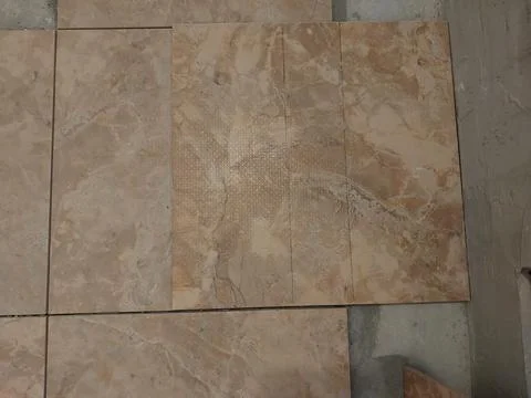 Laying tiles in the interior Stock-Fotos