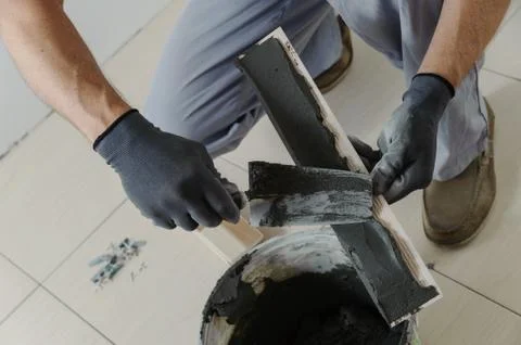 Laying the tiles Stock Photos
