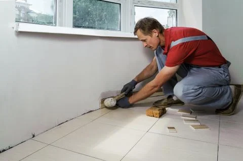 Laying the tiles Stock Photos