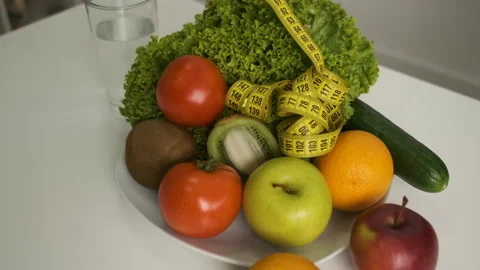 Laying waffles on a buffet table with vegetables and fruits Stock Footage 131201110