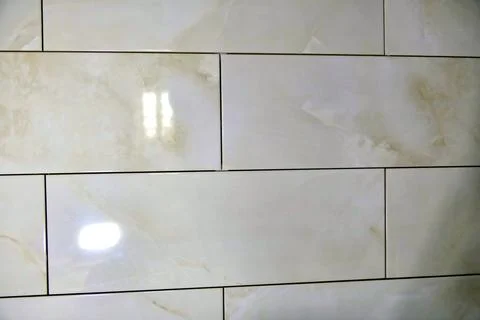 Laying Wall Tiles. Foto stock