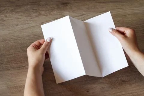 The layout of the booklet in the hands Stock Photos